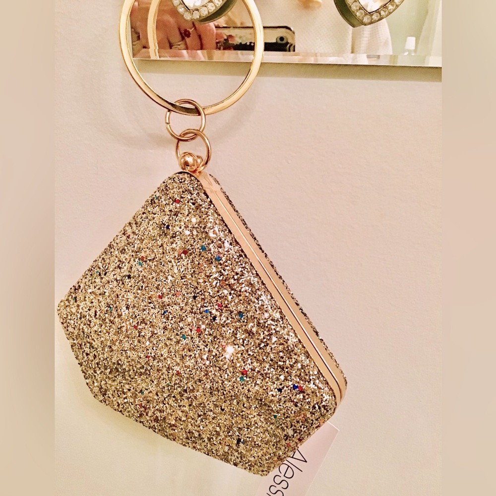 Beautiful gold Alessi handbag great for event , holiday night out